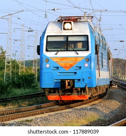 passenger train at the sunrise - Shutterstock ID 117889039