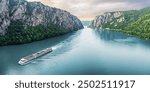 Passenger vessel cruising through the picturesque Iron Gate Gorge on a summer vacation trip