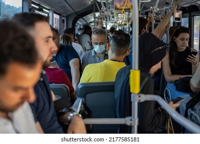 A Passenger Wearing A Mask In The Metrobus, Which Is A 50 Km Bus Rapid Transit Route, Although There Is No Mask Requirement In All Public Transportations In Istanbul, Turkey On July 8, 2022.