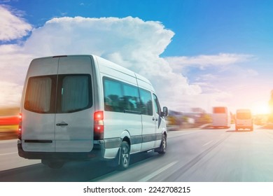 Passenger white bus van accelerating ride motion blur effect - Shutterstock ID 2242708215