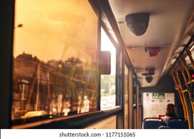 Passengers In The Bus Opened A Tinted Window In The Cabin Of The Bus That Would Cool The Outside Air Inside