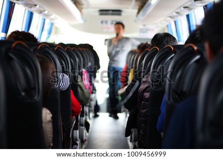  The passengers in the bus which are tourists and guide 