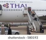 passengers getting onto the plane