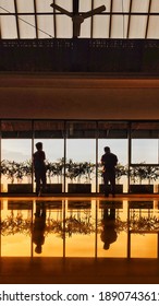 Passengers Are Hurrying To The Gate At The Airport, Glass Wall With Free View To The Apron. Natural Consep