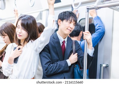 Passengers on a crowded train
