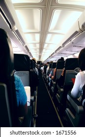 Passengers Onboard An Airplane