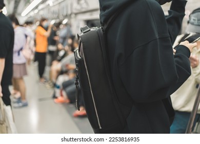 Passengers onboard a train on the Seoul underground rail system in Seoul, South Korea. - Shutterstock ID 2253816935