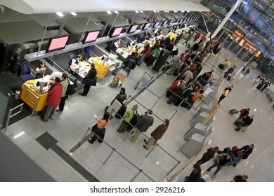 Passengers Queuing Up For Check-in