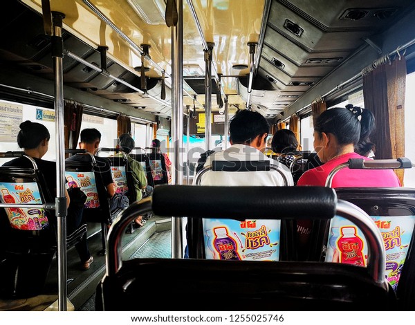 Passengers are sitting on a bus, Bangkok, Thailand,\
December 2018