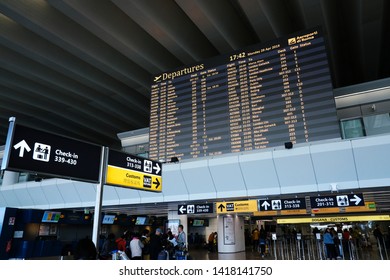 Passengers Walk In Departures Area Of Leonardo Da Vinci International Airport In Rome, Italy On April 29, 2019