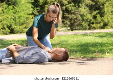 132 Man checking pulse for unconscious woman Images, Stock Photos ...