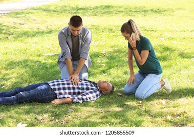 Passersby Helping Unconscious Man Outdoors First Stock Photo 1205855509 ...