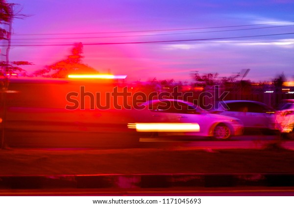 passing ambulance red\
light silhouette