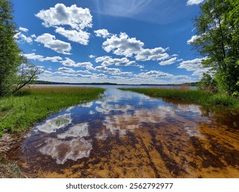 Passing by. Clouds, reflection, bewitched. I don't remember why I didn't swim then. Holy water, inviolable. 