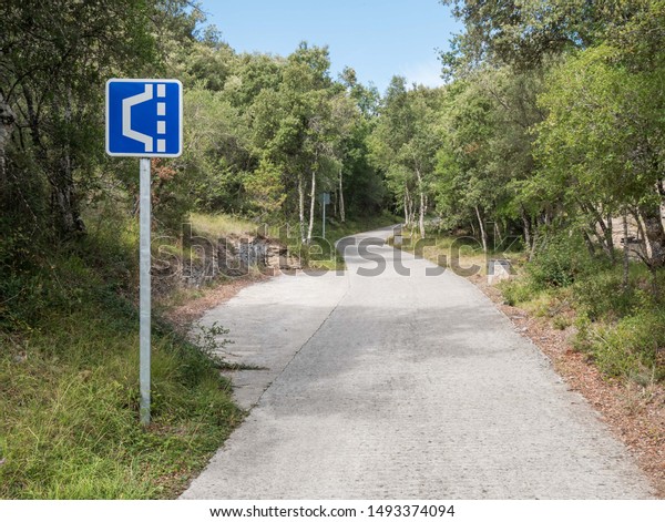 Passing place on a narrow road in the countryside\
in Spain