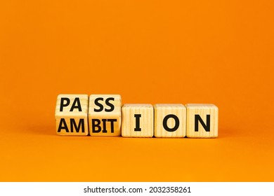 Passion or ambition symbol. Turned wooden cubes and changed the word 'ambition' to 'passion'. Beautiful orange table, orange background, copy space. Business, passion or ambition concept.