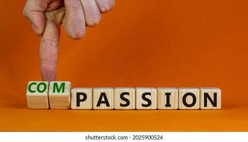 Passion Or Compassion Symbol. Businessman Turns Cubes, Changes The Word Compassion To Passion. Beautiful Orange Table, Orange Background, Copy Space. Business, Passion Or Compassion Concept.