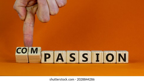 Passion Or Compassion Symbol. Businessman Turns Cubes, Changes The Word Compassion To Passion. Beautiful Orange Table, Orange Background, Copy Space. Business, Passion Or Compassion Concept.