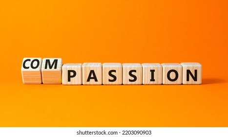 Passion Or Compassion Symbol. Turned Wooden Cubes And Changed The Word Compassion To Passion. Beautiful Orange Table, Orange Background, Copy Space. Business, Passion Or Compassion Concept.