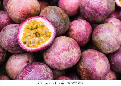 Passion Fruit Closeup Exotic (Maracuja ,granadilla,Maracuya ,Parcha ,Passiflora Edulis ) Macro Closeup Exotic Section Half Cut Seeds Passionfruit , Tropical Asian Fruits Diet Food Whole Passion Fruits