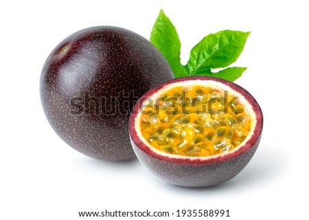 Passion fruit (Maracuya Passiflora) with cut in half sliced and green leaf isolated on white background. 