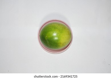 Passion Fruit On A Small Plate, Fruit With Sour Taste