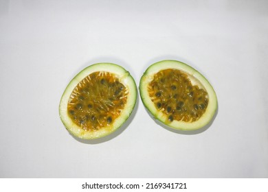 Passion Fruit Split In Small Plates, Fruit With Sour Taste