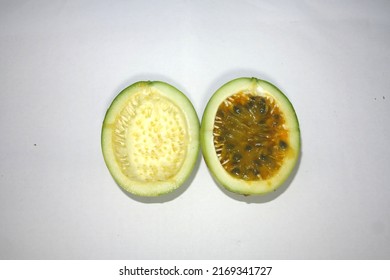 Passion Fruit Split In Small Plates, Fruit With Sour Taste