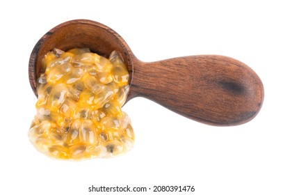 Passion Fruits Seeds In Wooden Spoon, Isolated On White Background. Passionfruit Or Maracuya Pulp, Exotic Fruit.