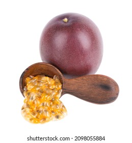 Passion Fruits Seeds In Wooden Spoon, Isolated On White Background. Passionfruit Or Maracuya Pulp, Exotic Fruit.