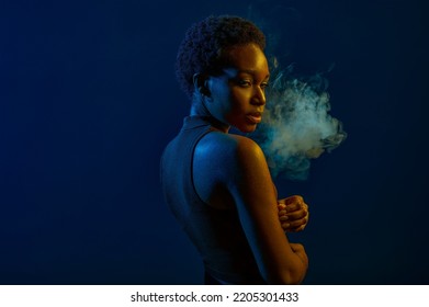 Passion Woman Blowing Smoke Curls