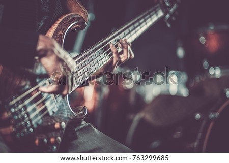 Passionate Guitarist Music Concept Photo.  Electric Guitar Playing Closeup Photo
 