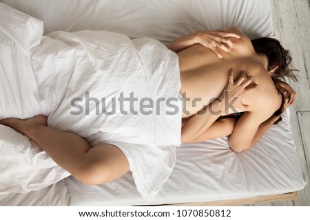 Passionate Sensual Lovers Enjoying Intimacy Making Love On Bed Hot Couple Having Sex On Sheets Passionate Sensual Lovers Enjoying Intimacy Making Love On Bed Hot Couple Having Sex On Sheets