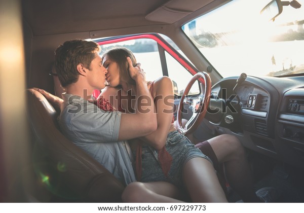 Passionate Young Couple Kissing Inside Car Stock Photo Edit No