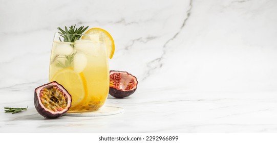 passionfruit cocktail. Tropical drink for summer party. on a light background, refreshing drink or beverage with ice, place for text. - Shutterstock ID 2292966899