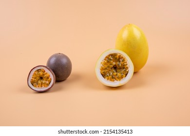 passionfruit and a half of maracuya isolated on white background. Clipping path included. Passion fruit isolated. Whole - Shutterstock ID 2154135413