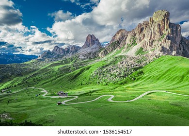 Passo Giau and Averau peak in green Dolomites, aerial view