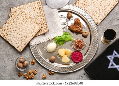 Passover Seder Plate With Traditional Food On Grunge Background