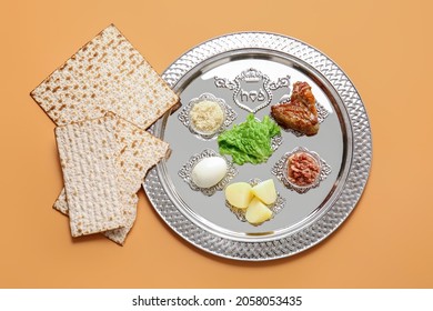 Passover Seder Plate With Traditional Food On Color Background