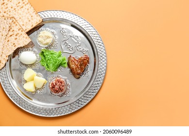 Passover Seder Plate With Traditional Food On Color Background