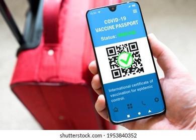 Passport of COVID-19 vaccination in mobile phone for travel, tourist shows smartphone with pass app in airport. Digital green certificate, proof of corona virus immunization. Theme of vaccine, tourism