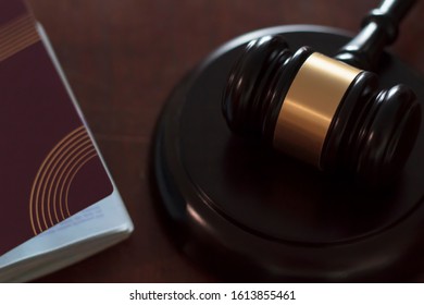 Passport And Law Gavel. Concept Of International Law, Immigration Law And Citizenship Rights