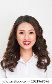 Passport Photo. Portrait Of Asian Smiling Woman.