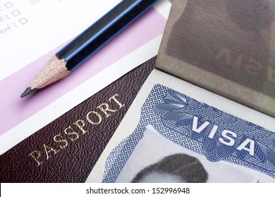 Passport And US Visa Background With  Immigration Application Form.