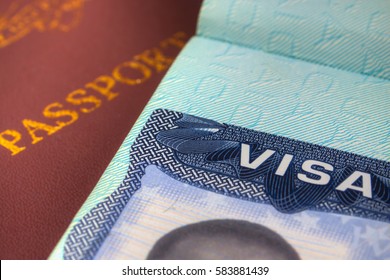 Passport and US Visa for immigration - Shutterstock ID 583881439