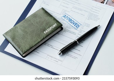 Passport And Visa Application On Table - Shutterstock ID 2157593093