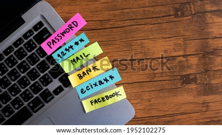 password management, password, mail, bank, facebook, message concept written post it on laptop keyboard.	