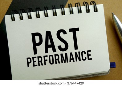 Past Performance Memo Written On A Notebook With Pen