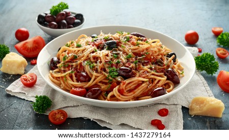 Pasta Alla Puttanesca with garlic, olives, capers, tomato and anchois fish