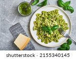 Pasta with basil pesto sauce. Farfalle pasta with basil pesto sauce. Pasta al pesto genovese.